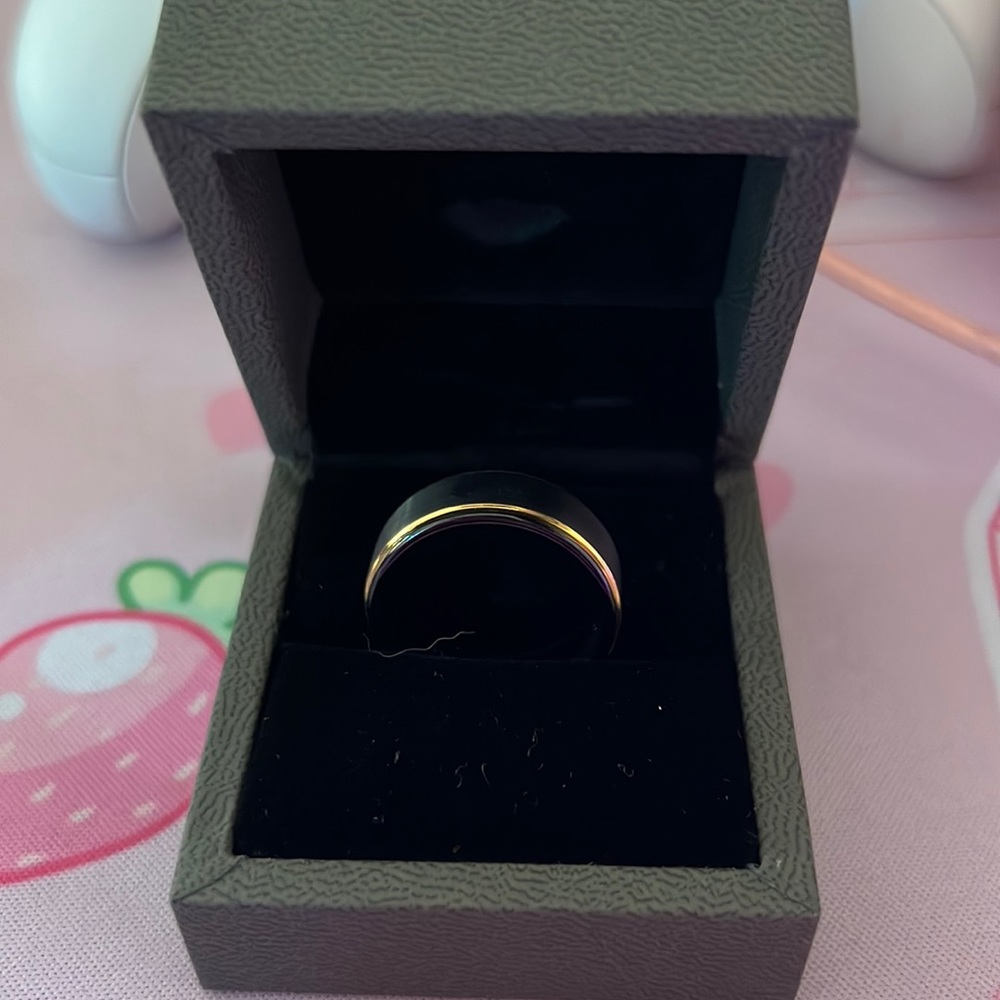 Black ring with gold strip